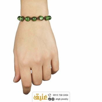 دستبند بافت ابسیدین سبز معدنی و حدید مکعبی‌ | سایت جواهری عتیق: atigh.jewelry
